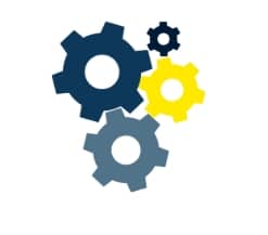 Trois engrenages de couleurs différentes s’emboîtent.